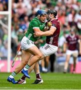 8 July 2023; Mike Casey of Limerick is tackled by Joseph Cooney of Galway during the GAA Hurling All-Ireland Senior Championship semi-final match between Limerick and Galway at Croke Park in Dublin. Photo by Brendan Moran/Sportsfile