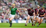 8 July 2023; Séamus Flanagan of Limerick is tackled by Seán Linnane of Galway during the GAA Hurling All-Ireland Senior Championship semi-final match between Limerick and Galway at Croke Park in Dublin. Photo by Brendan Moran/Sportsfile