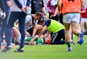 8 July 2023; Barry Nash of Limerick receives medical attention for an injury on the sideline during the GAA Hurling All-Ireland Senior Championship semi-final match between Limerick and Galway at Croke Park in Dublin. Photo by Piaras Ó Mídheach/Sportsfile