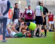 8 July 2023; Barry Nash of Limerick receives medical attention for an injury on the sideline during the GAA Hurling All-Ireland Senior Championship semi-final match between Limerick and Galway at Croke Park in Dublin. Photo by Piaras Ó Mídheach/Sportsfile