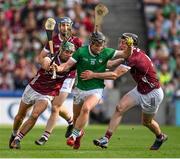 8 July 2023; Peter Casey of Limerick in action against Galway players, from left, Evan Niland and Pádraic Mannion during the GAA Hurling All-Ireland Senior Championship semi-final match between Limerick and Galway at Croke Park in Dublin. Photo by Brendan Moran/Sportsfile