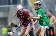 8 July 2023; Lily Foley, Tynock NS, Kiltegan, Wicklow, representing Galway, and ????Clodagh Boylan, Mount St Catherines, Armagh, representing Limerick, during the GAA INTO Cumann na mBunscol Respect Exhibition Go Games at the GAA Hurling All-Ireland Senior Championship semi-final match between Limerick and Galway at Croke Park in Dublin. Photo by Ramsey Cardy/Sportsfile