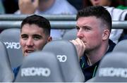 8 July 2023; Injured Limerick players Sean Finn, left, and Declan Hannon sit in the substitutes bench before the GAA Hurling All-Ireland Senior Championship semi-final match between Limerick and Galway at Croke Park in Dublin. Photo by Brendan Moran/Sportsfile