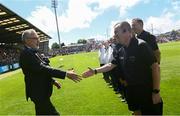 9 July 2023; Uachtarán Chumann Lúthchleas Gael Larry McCarthy meets referee Seán Lonergan before the Electric Ireland GAA Football All-Ireland Minor Championship final match between Derry and Monaghan at Box-IT Athletic Grounds in Armagh. Photo by Ramsey Cardy/Sportsfile