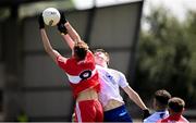 9 July 2023; Tommy Rogers of Derry and Matthew Carolan of Monaghan during the Electric Ireland GAA Football All-Ireland Minor Championship final match between Derry and Monaghan at Box-IT Athletic Grounds in Armagh. Photo by Ramsey Cardy/Sportsfile