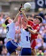 9 July 2023; Conor Jones, left, and Luke McKenna of Monaghan in action against Cahal McKaigue, left, and Odhran Campbell of Derry during the Electric Ireland GAA Football All-Ireland Minor Championship final match between Derry and Monaghan at Box-IT Athletic Grounds in Armagh. Photo by Ramsey Cardy/Sportsfile