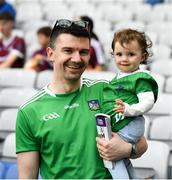8 July 2023; Eoin McEnery and his 17 month old daughter Aodha from Abbeyfeale before the All-Ireland Senior Camogie Championship quarter-final match between Tipperary and Antrim at Croke Park in Dublin. Photo by Stephen Marken/Sportsfile