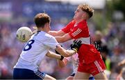 9 July 2023; Rory Small of Derry in action against Matthew Carolan of Monaghan during the Electric Ireland GAA Football All-Ireland Minor Championship final match between Derry and Monaghan at Box-IT Athletic Grounds in Armagh. Photo by Ramsey Cardy/Sportsfile