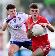 9 July 2023; Johnny McGuckin of Derry in action against Caolan Clerkin of Monaghan during the Electric Ireland GAA Football All-Ireland Minor Championship final match between Derry and Monaghan at Box-IT Athletic Grounds in Armagh. Photo by Ramsey Cardy/Sportsfile