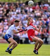 9 July 2023; Oisín Doherty of Derry in action against Caolan Clerkin of Monaghan during the Electric Ireland GAA Football All-Ireland Minor Championship final match between Derry and Monaghan at Box-IT Athletic Grounds in Armagh. Photo by Ramsey Cardy/Sportsfile