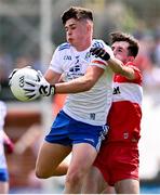 9 July 2023; Tomas Quinn of Monaghan in action against Cahir Speir of Derry during the Electric Ireland GAA Football All-Ireland Minor Championship final match between Derry and Monaghan at Box-IT Athletic Grounds in Armagh. Photo by Ramsey Cardy/Sportsfile