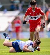 9 July 2023; Cahir Speir of Derry collides with Tomas Quinn of Monaghan, for which Cahir Speir was shown a red card, during the Electric Ireland GAA Football All-Ireland Minor Championship final match between Derry and Monaghan at Box-IT Athletic Grounds in Armagh. Photo by Ramsey Cardy/Sportsfile