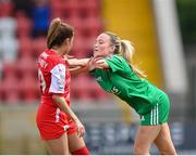 9 July 2023; Katie Markey of Cliftonville and Lauren Walsh of Cork City tussle during the Avenir Sports All-Island Cup semi-final match between Cliftonville and Cork City United at Solitude in Belfast. Photo by Stephen Marken/Sportsfile