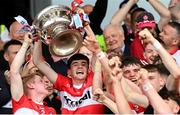 9 July 2023; Derry joint-captains Fionn McEldowney, left, and Cahir Speir lift the Tom Markham Cup after the Electric Ireland GAA Football All-Ireland Minor Championship final match between Derry and Monaghan at Box-IT Athletic Grounds in Armagh. Photo by Ramsey Cardy/Sportsfile