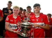 9 July 2023; Derry joint-captains Fionn McEldowney, left, and Cahir Speir lift the Tom Markham Cup after the Electric Ireland GAA Football All-Ireland Minor Championship final match between Derry and Monaghan at Box-IT Athletic Grounds in Armagh. Photo by Ramsey Cardy/Sportsfile