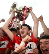 9 July 2023; Cahir Speir of Derry celebrates with the Tom Markham Cup after the Electric Ireland GAA Football All-Ireland Minor Championship final match between Derry and Monaghan at Box-IT Athletic Grounds in Armagh. Photo by Ramsey Cardy/Sportsfile