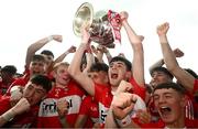 9 July 2023; Cahir Speir of Derry celebrates with the Tom Markham Cup after the Electric Ireland GAA Football All-Ireland Minor Championship final match between Derry and Monaghan at Box-IT Athletic Grounds in Armagh. Photo by Ramsey Cardy/Sportsfile