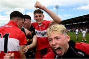 9 July 2023; Tommy Rogers of Derry, right, celebrates after the Electric Ireland GAA Football All-Ireland Minor Championship final match between Derry and Monaghan at Box-IT Athletic Grounds in Armagh. Photo by Ramsey Cardy/Sportsfile