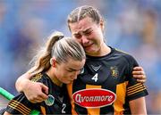 9 July 2023; Michelle Teehan of Kilkenny, left, consoles her fellow corner back Tiffanie Fitzgerald after their side's defeat in the All-Ireland Senior Camogie Championship quarter-final match between Cork and Kilkenny at Croke Park in Dublin. Photo by Piaras Ó Mídheach/Sportsfile