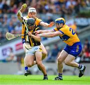 9 July 2023; Mikey Butler of Kilkenny is tackled by Ryan Taylor and Seadna Morey of Clare during the GAA Hurling All-Ireland Senior Championship semi-final match between Kilkenny and Clare at Croke Park in Dublin. Photo by Ray McManus/Sportsfile