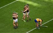 9 July 2023; Kilkenny players, left to right, Alan Murphy, Eoin Murphy, Eoin Cody, and Walter Walsh, celebrate as a dejected Ian Galvin of Clare falls to the fround after the GAA Hurling All-Ireland Senior Championship semi-final match between Kilkenny and Clare at Croke Park in Dublin. Photo by Daire Brennan/Sportsfile