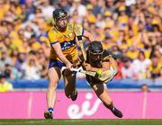 9 July 2023; Mikey Butler of Kilkenny is tackled by Tony Kelly of Clare during the GAA Hurling All-Ireland Senior Championship semi-final match between Kilkenny and Clare at Croke Park in Dublin. Photo by John Sheridan/Sportsfile