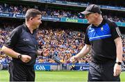 9 July 2023; Referee Colm Lyons in conversation with Clare manager Brian Lohan before the GAA Hurling All-Ireland Senior Championship semi-final match between Kilkenny and Clare at Croke Park in Dublin. Photo by Piaras Ó Mídheach/Sportsfile