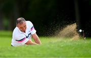 9 July 2023; Kevin Commins of Cloverhill Golf Club plays out of the bunker on the ninth hole during the 61st All Ireland Father & Sons Championship at Castle Golf Club in Rathfarnham, Dublin.  Photo by Tyler Miller/Sportsfile