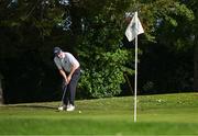 9 July 2023; Peter Cosgrove of Castle Golf Club takes his shot from the Seventeenth green during the 61st All Ireland Father & Sons Championship at Castle Golf Club in Rathfarnham, Dublin. Photo by Tyler Miller/Sportsfile