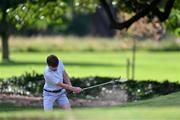 9 July 2023; John Cosgrove of Castle Golf Club plays out of the bunker on the eighteenth hole during the 61st All Ireland Father & Sons Championship at Castle Golf Club in Rathfarnham, Dublin. Photo by Tyler Miller/Sportsfile