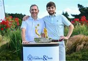 9 July 2023; Pictured is the winners of the All Ireland Father and Son John Cosgrove of Castle Golf Club, right, and his father, Peter Cosgrove, celebrate with the trophy after winning the 61st All Ireland Father & Sons Championship at Castle Golf Club in Rathfarnham, Dublin. Photo by Tyler Miller/Sportsfile