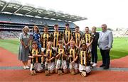 9 July 2023; The Kilkenny team, backrow, left to right, Charlie O’Brien, Tattygar PS, Lisbellaw, Fermanagh, Oliver Clarke, Killinkere NS, Virginia, Cavan, Dara Kavanagh, Duniry NS, Loughrea, Galway, Adam Slevin, Kiernan Scoil Mhuire, Loughegar, Mullingar, Westmeath, Erin Morrissey, Rathnure NS, Enniscorthy, Wexford, front row, left to right, Rory Farrelly, Scoil Treasa, Firhouse, Dublin, Paul Ralph, St Brendan's NS, Drummond, St Mullins, Carlow, Isaac Barry, Rathangan NS, Duncormick, Wexford, Patrick O'Loughlin, St Brigid's PS, Maghera, Derry, Andile Le Shane, St Clare's PS, Manorhamilton, Leitrim, with INTO President Dorothy McGinley, Uachtarán an Cumann Camógaíochta Hilda Breslin, President of Cumann na mBunscol Mairéad O'Callaghan, and Chairman Munster council Ger Ryan, ahead of the GAA INTO Cumann na mBunscol Respect Exhibition Go Games at the GAA Hurling All-Ireland Senior Championship semi-final match between Kilkenny and Clare at Croke Park in Dublin. Photo by Daire Brennan/Sportsfile