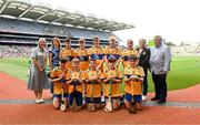 9 July 2023; The Clare team, backrow, left to right, Noah Glennon, Camcloon NS, Camcloon, Roscommon, Jason Gaynor, Glenderry NS, Tralee, Kerry, Eoghan Rice, Scoil Mhuire Latton, Castleblayney, Monaghan, Fionn Harrington, Banada NS, Tourlestrane, Sligo, David Barry, Cloghroe NS, Cloghroe, Cork, front row, left to right, Liam O'Brien, Fuerty NS, Castlecoote, Roscommon, Henry McKenna, Derrylatinee St Francis, Dungannon, Tyrone, Lukah Williams, Cloughjordan NS, Cloughjordan, Tipperary, Mark Byrne, St Patrick's NS, Geevagh, Sligo, James Verling, Leugh NS, Thurles, Tipperary, with INTO President Dorothy McGinley, Uachtarán an Cumann Camógaíochta Hilda Breslin, President of Cumann na mBunscol Mairéad O'Callaghan, and Chairman Munster council Ger Ryan ahead of the GAA INTO Cumann na mBunscol Respect Exhibition Go Games at the GAA Hurling All-Ireland Senior Championship semi-final match between Kilkenny and Clare at Croke Park in Dublin. Photo by Daire Brennan/Sportsfile