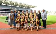 9 July 2023; The Kilkenny team, backrow, left to right, Alicia Roche, St Laurence's NS, Athy, Kildare, Olivia Power, Clara NS, Clara, Kilkenny, Cara Giblin, Ardrahan NS, Ardrahan, Galway, Aoife Colbard, Gaelscoil Shliabh Rua Bóthar, Bhaile Uí Ógáin, Co Átha Cliath, Aideen McKeever, Scoil Áine NS, Raheny, Dublin, Laoise Ní Ghormáin, Scoil Oilibhéir, Cúil Mhín, Co Átha Cliath, Leyla Ahern, Scoil an Chroí Ró-Naofa, Urlingford, Kilkenny, Willow Parker, St. Mary's NS, Edgeworthstown, Longford, Ali Doyle, St Olaf's NS, Dundrum, Dublin, Annamai Burke, St Patrick's NS, Johnstownbridge, Kildare, with INTO President Dorothy McGinley, Uachtarán an Cumann Camógaíochta Hilda Breslin, President of Cumann na mBunscol Mairéad O'Callaghan, and Chairman Munster council Ger Ryan, ahead of the GAA INTO Cumann na mBunscol Respect Exhibition Go Games at the GAA Hurling All-Ireland Senior Championship semi-final match between Kilkenny and Clare at Croke Park in Dublin. Photo by Daire Brennan/Sportsfile