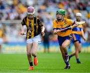 9 July 2023; Aideen McKeever, Scoil Áine NS, Raheny, Dublin, representing Kilkenny is tackled by Avah Tooher, Coolderry NS, Coolderry, Offaly, representing Clare, during the GAA INTO Cumann na mBunscol Respect Exhibition Go Games at the GAA Hurling All-Ireland Senior Championship semi-final match between Kilkenny and Clare at Croke Park in Dublin. Photo by Ray McManus/Sportsfile