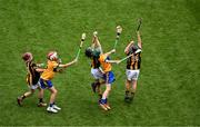9 July 2023; Kilkenny players, left to right, Patrick O'Loughlin, St Brigid's PS, Maghera, Derry, Isaac Barry, Rathangan NS, Duncormick, Wexford, and Rory Farrelly, Scoil Treasa, Firhouse, Dublin, in action against Noah Glennon, Camcloon NS, Camcloon, Roscommon, left, and Henry McKenna, Derrylatinee St Francis, Dungannon, Tyrone, representing Clare, during the GAA INTO Cumann na mBunscol Respect Exhibition Go Games at the GAA Hurling All-Ireland Senior Championship semi-final match between Kilkenny and Clare at Croke Park in Dublin. Photo by Daire Brennan/Sportsfile