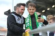 11 July 2023; Shamrock Rovers manager Stephen Bradley stands for a 'selfie' with a Shamrock Rovers supporter before the UEFA Champions League First Qualifying Round 1st Leg match between Shamrock Rovers and Breidablik at Tallaght Stadium in Dublin. Photo by Ben McShane/Sportsfile