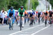 11 July 2023; Oisin Ferrity of Team Ireland, right, on his way to finishing third during stage one of the 2023 Junior Tour Of Ireland in Clare. Photo by Stephen McMahon/Sportsfile