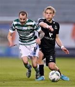 11 July 2023; Sean Kavanagh of Shamrock Rovers is tackled by Ágúst Hlynsson of Breidablik during the UEFA Champions League First Qualifying Round 1st Leg match between Shamrock Rovers and Breidablik at Tallaght Stadium in Dublin. Photo by Ben McShane/Sportsfile