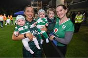 12 July 2023; Katie McCabe with Amy Barrett, from Brisbane, originally Mallow, Cork, and her children, from left, 6-month old twins Finín and Meadhbh, and 3-year-old Éabha after a Republic of Ireland open training session at Meakin Park in Brisbane, Australia, ahead of the start of the FIFA Women's World Cup 2023. Photo by Stephen McCarthy/Sportsfile