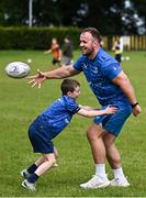 12 July 2023; Leinster player Ed Byrne with Hugh Purcell during a Bank of Ireland Leinster Rugby summer camp at County Carlow FC in Carlow.  Photo by Harry Murphy/Sportsfile