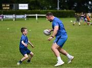 12 July 2023; Leinster player Ed Byrne with Hugh Purcell during a Bank of Ireland Leinster Rugby summer camp at County Carlow FC in Carlow.  Photo by Harry Murphy/Sportsfile