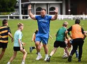12 July 2023; Leinster player Ed Byrne with attendees during a Bank of Ireland Leinster Rugby summer camp at County Carlow FC in Carlow.  Photo by Harry Murphy/Sportsfile