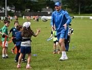12 July 2023; Attendees with Leinster player Rhys Ruddock during a Bank of Ireland Leinster Rugby summer camp at County Carlow FC in Carlow.  Photo by Harry Murphy/Sportsfile