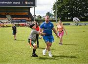 12 July 2023; Leinster player Ed Byrne and attendees during a Bank of Ireland Leinster Rugby summer camp at County Carlow FC in Carlow.  Photo by Harry Murphy/Sportsfile
