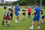 12 July 2023; Leinster players Rhys Ruddock and Ed Byrne with attendees during a Bank of Ireland Leinster Rugby summer camp at County Carlow FC in Carlow.  Photo by Harry Murphy/Sportsfile