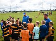 12 July 2023; Leinster players Rhys Ruddock and Ed Byrne with attendees during a Bank of Ireland Leinster Rugby summer camp at County Carlow FC in Carlow.  Photo by Harry Murphy/Sportsfile