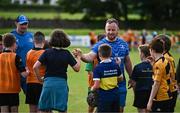 12 July 2023; Leinster players Ed Byrne and Rhys Ruddock with attendees during a Bank of Ireland Leinster Rugby summer camp at County Carlow FC in Carlow.  Photo by Harry Murphy/Sportsfile