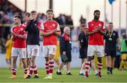 12 July 2023; St Patrick's Athletic players, from left, Jason McClelland, Alex Nolan, Tommy Lonergan and Noah Lewis applaud supporters after their side's defeat in the UEFA Europa Conference League First Qualifying Round 1st Leg match between F91 Diddeleng and St Patrick's Athletic at Stade Jos Nosbaum in Dudelange, Luxembourg. Photo by Gerry Schmit/Sportsfile
