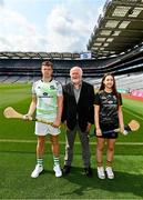 14 July 2023; Reigning champion Killian Phelan of Kilkenny, left, and Hazel Austin of Dublin with event sponsor Martin Donnelly during the launch of the M. Donnelly MyClubShop.ie Poc Fada at Croke Park in Dublin. Photo by Ben McShane/Sportsfile